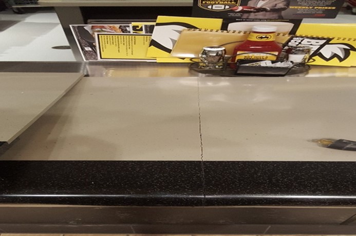 Before A 16 Inch Seam Separation Located On The Bar Top Surface